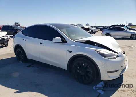 2023 Tesla Model Y из США, поврежденный, VIN 7SAYGAEE0PF686760
